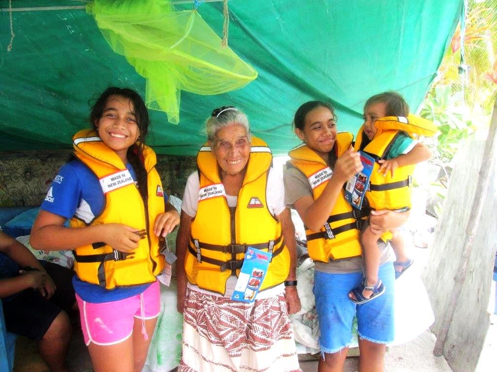 Distributing Life Jackets on Palmerston Island in November 2016.