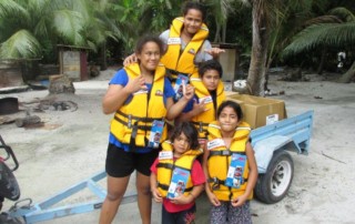 Distributing Life Jackets on Palmerston Island in November 2016.