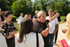 Man speaking to group.